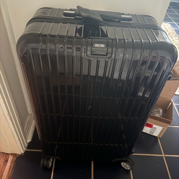 RIMOWA Handbags - RIMOWA Glossy Black Suitcase